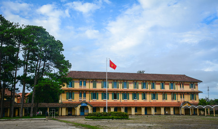 Ancient Lycee Yersin School with pine trees in Dalat, Vietnam. Da Lat is located on the Langbian Plateau in the southern parts of the Central Highlands.のeditorial素材