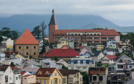 Dalat, Vietnam - Jul 5, 2016. Aerial view of downtown in Dalat, Vietnam. Da Lat in Central Highlands, is centered around a lake and golf course, and surrounded by hills, pine forests.のeditorial素材