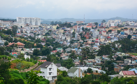 Dalat, Vietnam - Jul 5, 2016. Many houses on the hill at downtown in Dalat, Vietnam. Da Lat is located on the Langbian Plateau in the southern parts of the Central Highlands region.のeditorial素材