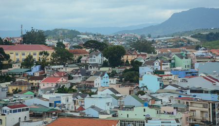 Dalat, Vietnam - Jul 5, 2016. Houses on the hill at downtown in Dalat, Vietnam. The architecture of Dalat is dominated by the style of the French colonial period.のeditorial素材
