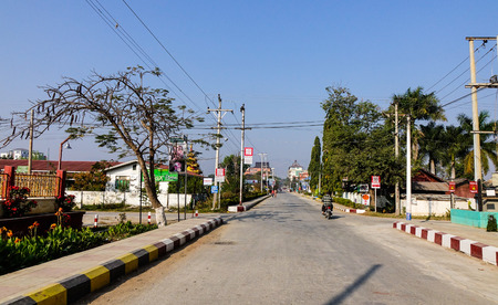 Nyaungshwe, Myanmar - Feb 14, 2016. Main street at sunny day in Nyaungshwe Township, Myanmar. Nyaungshwe is a township of Taunggyi, the main access point for Inle Lake.のeditorial素材