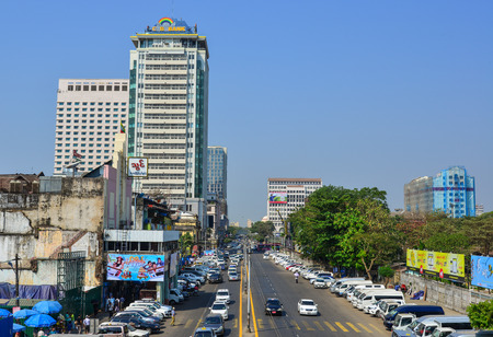 Yangon, Myanmar - Feb 13, 2017. Traffic on main street at downtown in Yangon, Myanmar. Yangon is...