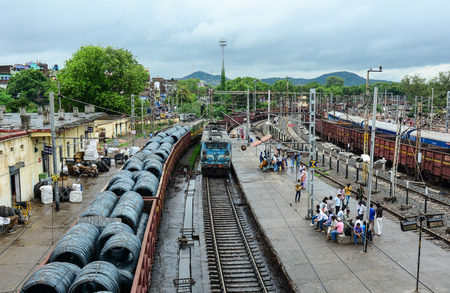 Gaya, India - Jul 9, 2015. People waiting at Gaya Jn Station in India. Indian Railways is the fourth largest railway network in the world comprising 119,630 km of total track.のeditorial素材
