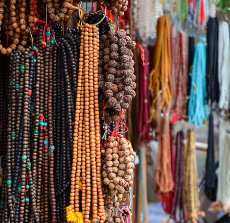 The largest collection of rosaries for sale at street market in Bodhgaya, India.の写真素材