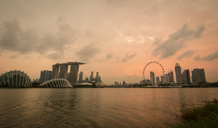 Singapore - Jul 4, 2015. Skyline at night in Marina Bay, Singapore. Since independence in 1965, the Singapore economy has experienced rapid economic development.のeditorial素材