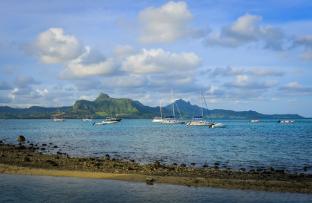 Le Morne, Mauritius - Jan 8, 2017. Tourist boats on the sea in Le Morne, Mauritius. Mauritius is a major tourist destination, ranking 3rd in the region and 56th globally.のeditorial素材