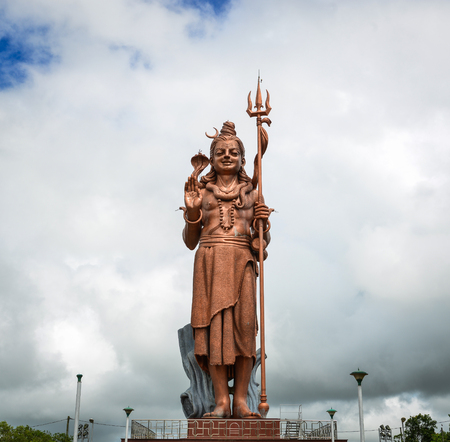 Huge statue of Lord Shiva (Mangal Mahadev) at Grand Bassin in Mauritius. Mangal Mahadev statue is...