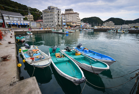 Katsuura, Japan - Nov 30, 2016. Small boats at Katsuura Harbor and fishing village in Japan. Nachi-Katsuura is a town on the southeastern coast of the Kii Peninsula, Kansai region.のeditorial素材