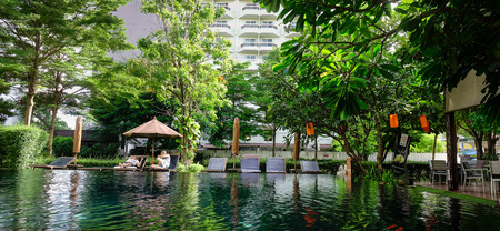 Pattaya, Thailand - Jun 20, 2017. Outdoor swimming pool at Jomtien District in Pattaya, Thailand....