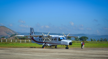 Coron, Philippines - Apr 12, 2017. Dornier Do 228 aircraft docking at Francisco B. Reyes Airport in...