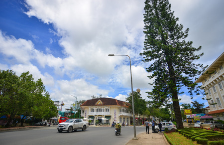 Dalat, Vietnam - Aug 19, 2017. People with vehicles on street in Dalat, Vietnam. Da Lat is a popular tourist destination, located 1,500m above sea level on the Langbian Plateau.のeditorial素材