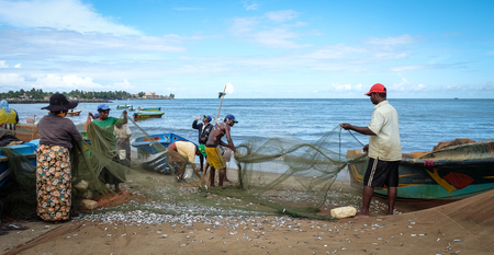 Colombo, Sri Lanka - Sep 5, 2015. Fishermen working at a village in Colombo, countryside Sri Lanka. Colombo is the commercial capital and largest city of Sri Lanka.のeditorial素材