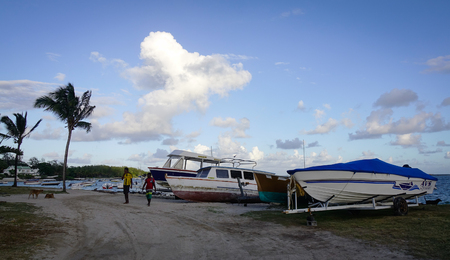 Grand Baie, Mauritius - Jan 11, 2017. Tourist boats on beach in Mauritius. Mauritius is an island nation in the Indian Ocean about 2,000 km off the southeast coast of the African continent.のeditorial素材