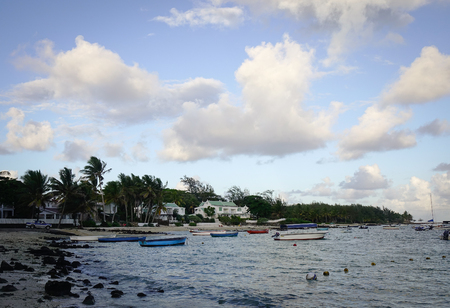 Grand Baie, Mauritius - Jan 11, 2017. Tourist boats docking at Grand Baie in Mauritius. Mauritius enjoys a tropical climate with clear warm sea waters, beaches and cultural population.のeditorial素材