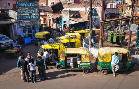 Agra, India - Mar 10, 2012. People and vehicles on street in Agra, India. Agra is one of the most populous cities in Uttar Pradesh, and the 24th most populous in India.のeditorial素材