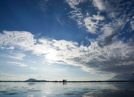 Lake scenery with cloudscape at sunny day in Srinagar, India.の写真素材
