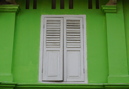 Wooden door at the old house in Chinatown, Singapore.の写真素材