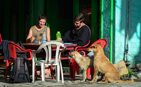 Jammu, India - Jul 23, 2015. People sitting at outdoor coffee shop in Jammu, India. Jammu is the most populous district in the Indian state of Jammu and Kashmir.のeditorial素材