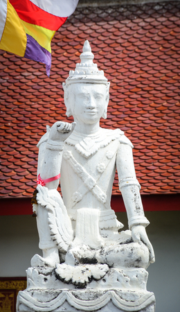 A white Buddha statue of Buddhist temple in Chiang Mai, Thailand. Most temples in Chiang Mai are of the Lanna style, dating between the 13th and 18th centuries.の写真素材