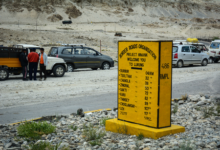 Ladakh, India - Jul 21, 2015. Milestone and direction sign on road in Ladakh, India. Ladakh is a mountainous region in the disputed northwest Jammu and Kashmir area in north India.のeditorial素材