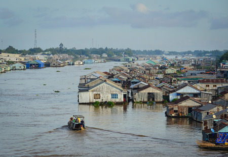 An Giang, Vietnam - Sep 3, 2017. Floating wooden houses on Bassac River in An Giang, Vietnam. An Giang is located to the west of the Mekong Delta between the Tien and Hau rivers.のeditorial素材
