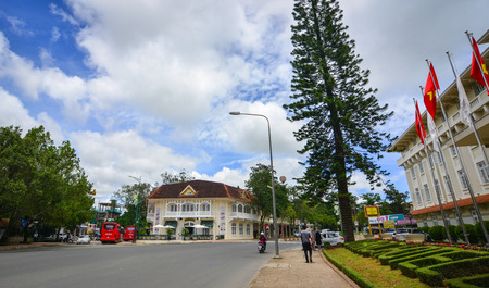 Dalat, Vietnam - Aug 19, 2017. People with vehicles on street in Dalat, Vietnam. Da Lat is a popular tourist destination, located 1500m above sea level on the Langbian Plateau.のeditorial素材