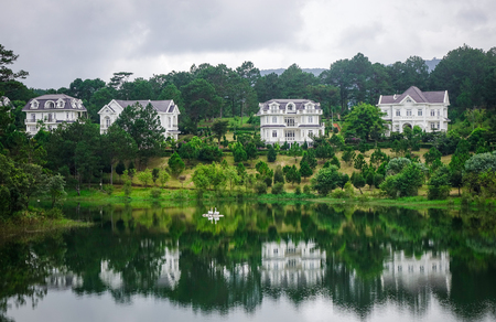 Dalat, Vietnam - Aug 18, 2017. Sacom Resort with a lake in Dalat, Vietnam. Da Lat is a popular tourist destination located 1500m above sea level on the Langbian Plateau.のeditorial素材