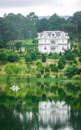 Dalat, Vietnam - Aug 18, 2017. Luxury resort with a lake in Dalat, Vietnam. Da Lat is a popular tourist destination located 1500m above sea level on the Langbian Plateau.のeditorial素材