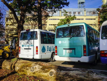 Yamanashi, Japan - Dec 4, 2016. Cars at parking lot near Lake Kawaguchiko in Yamanashi Prefecture. Kawaguchiko has some of the best views of Fuji in Japan.のeditorial素材