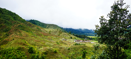 Mountain scenery in Bhutan. Bhutan economy is based on agriculture, forestry, tourism and the sale of hydroelectric power.の写真素材