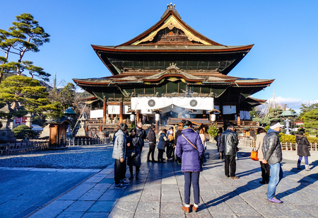 Nagano, Japan - Dec 29, 2015. People praying at Zenkoji Temple in Nagano, Japan. Zenko-ji was founded before Buddhism in Japan split into several different sects.のeditorial素材