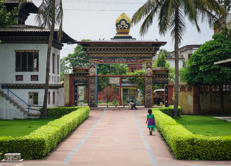 Bodhgaya, India - July 9, 2015. View of the traditional Bhutanese Buddhist temple at sunny day in Bodhgaya, India. Bodh Gaya is the most revered of all Buddhist sacred sites.のeditorial素材