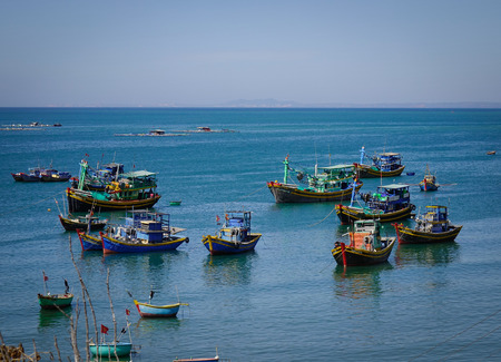 Phan Thiet, Vietnam - Mar 26, 2017. Wooden boats on the sea in Phan Thiet, Vietnam. Phan Thiet belongs to Binh Thuan province and located 200km South of Cam Ranh Bay.のeditorial素材