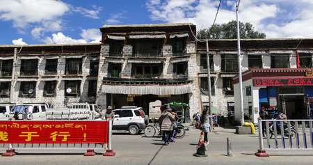 Tibet, China - Sep 7, 2012. Old Tibetan palace of the Jokhang temple in Lhasa, Tibet. The Jokhang Temple has two Buddha statues sacred to Tibetan Buddhists.のeditorial素材