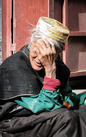 Tibet, China - Sep 7, 2012. Portrait of a Tibetan woman in Lhasa, Tibet. The centre of the Tibetan Buddhist world for over a millennium, Lhasa remains largely a city of wonders.のeditorial素材
