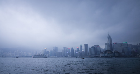 Hong Kong - Mar 29, 2017. View of Victoria Harbor at misty day in Hong Kong. In 2014 Hong Kong was the 11st most popular destination for international tourists.のeditorial素材