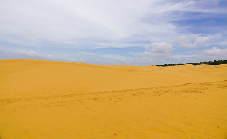Landscape of the sand dunes at sunny day in Mui Ne, Vietnam. Mui Ne is a town and cape located 180 kilometers east of Ho Chi Minh City.の写真素材
