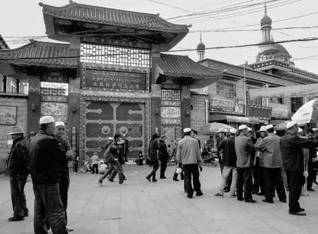 Tibet, China - Sep 5, 2010. People walk around Jokhang temple in Tibet. Tibetans, in general, consider Jokhang as the most sacred and important temple in Tibet.のeditorial素材