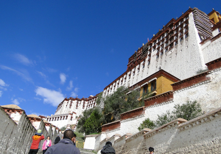 Tibet, China - Sep 6, 2010. People visit Potala Palace in Lhasa, Tibet Region, China. Potala was the residence of the Dalai Lama until the 14th Dalai Lama fled to India during the 1959.のeditorial素材