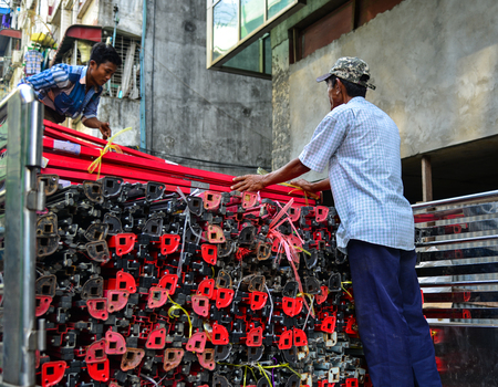 Yangon, Myanmar - Feb 1, 2017. People working on street in Yangon, Myanmar. Yangon is Myanmar largest city and its most important commercial centre.のeditorial素材