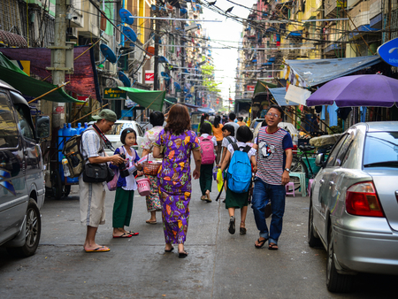 Yangon, Myanmar - Feb 1, 2017. People walking on street in Yangon, Myanmar. Yangon is Myanmar largest city and its most important commercial centre.のeditorial素材