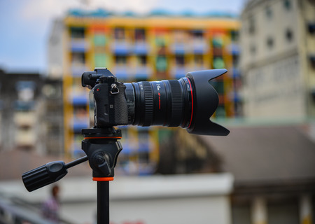 Yangon, Myanmar - Feb 1, 2017. A camera with tripod in Yangon, Myanmar. Yangon is the country main centre for trade industry and tourism.のeditorial素材
