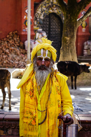 Kathmandu, Nepal - Oct 17, 2017. A Sadhu standing at Durbar Squares in Kathmandu, Nepal. Durbar Squares are most prominent remnants of those old kingdoms in Nepal.のeditorial素材