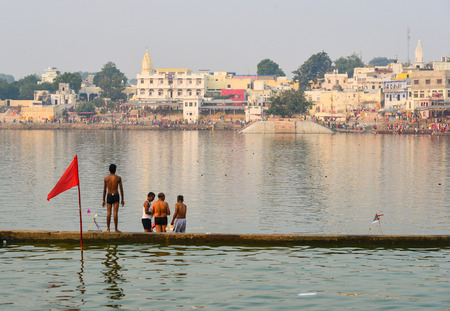 Pushkar, India - Nov 5, 2017. Local people bathing on the holy lake in Pushkar, India. Pushkar is a town in the Ajmer district in the state of Rajasthan.のeditorial素材