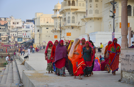 Pushkar, India - Nov 5, 2017. Indian women in sari walking on street in Pushkar, India. Pushkar is a town in the Ajmer district in the state of Rajasthan.のeditorial素材