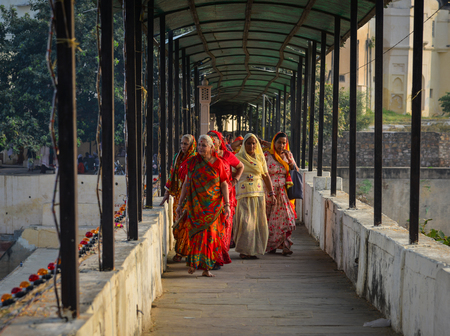 Pushkar, India - Nov 5, 2017. People walking on street in Pushkar, India. Pushkar is only 11km from Ajmer, separated from it by rugged Nag Pahar (Snake Mountain).のeditorial素材