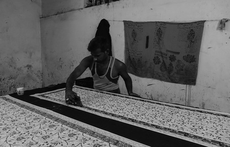Jaipur, India - Nov 1, 2017. A man working at dyeing factory in Jaipur, India. Jaipur is the capital and the largest city of the Indian state of Rajasthan in Western India.のeditorial素材