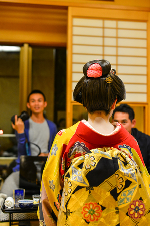 Akita, Japan - May 17, 2017. A Geisha working at restaurant in Akita, Japan. Modern geisha still live in traditional geisha houses called okiya in areas called hanamachi.のeditorial素材