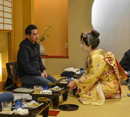 Akita, Japan - May 17, 2017. A Geisha working at restaurant in Akita, Japan. Geisha skills include performing various arts such as music, dance, and conversation.のeditorial素材
