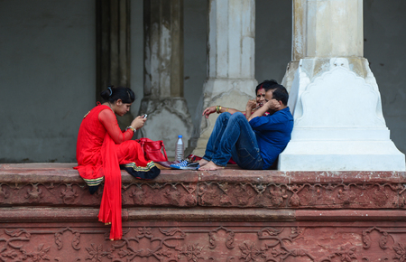 Agra, India - Jul 13, 2015. People sitting at Diwan-i-Aam Palace of Agra Fort in Agra, India. The fort was main residence of the emperors of the Mughal Dynasty till 1638.のeditorial素材
